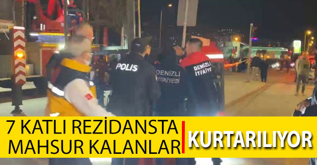 7 katlı rezidansta mahsur kalanlar kurtarılıyor